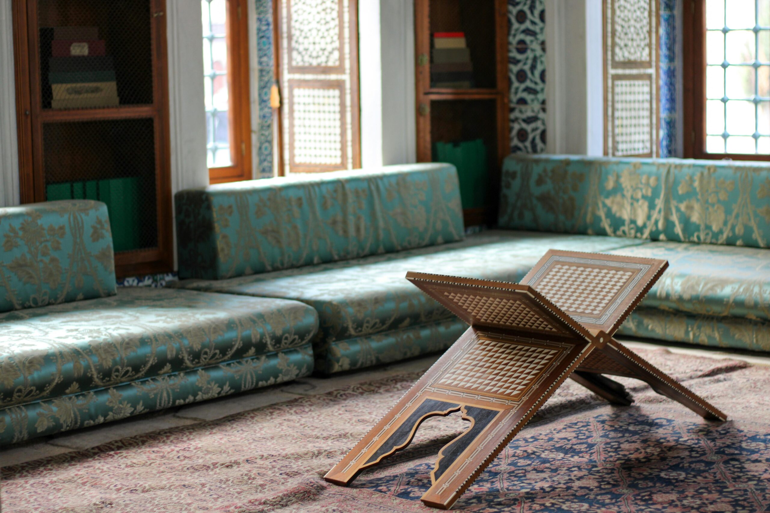Explore the ornate Ottoman library with Islamic art and plush seating in Istanbul's Topkapi Palace.